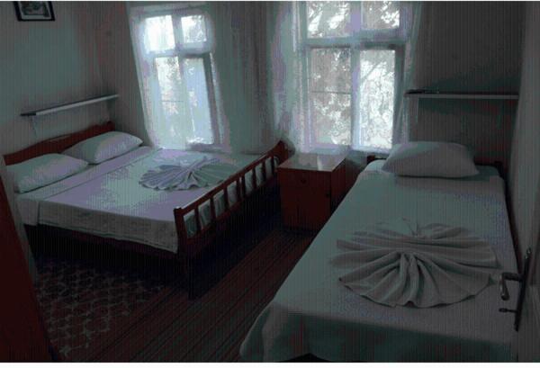 Üç Kişilik Oda